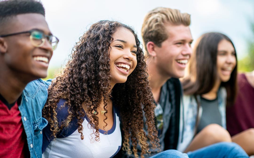 group of smiling teenagers